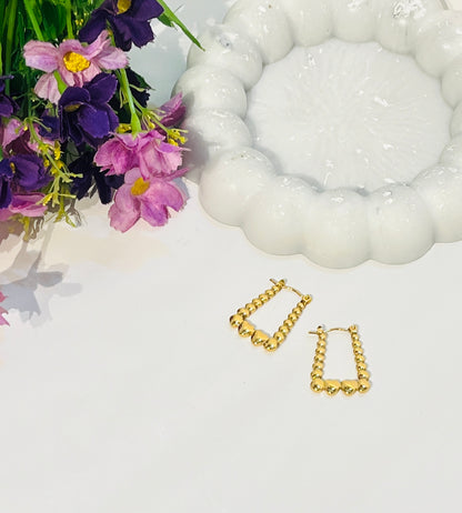 Anti tarnish Long Heart Hoops