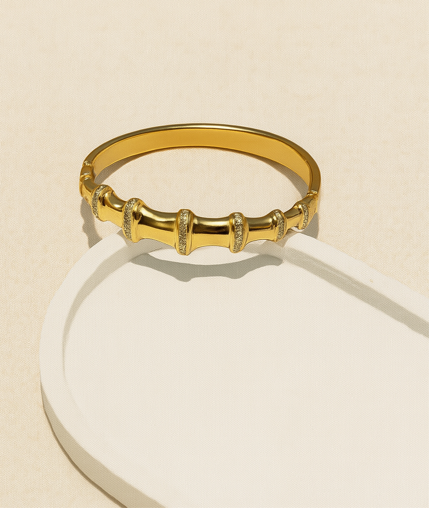 Elegant Gold-Tone Barrel & Crystal Bangle Bracelet