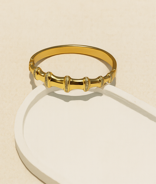 Elegant Gold-Tone Barrel & Crystal Bangle Bracelet