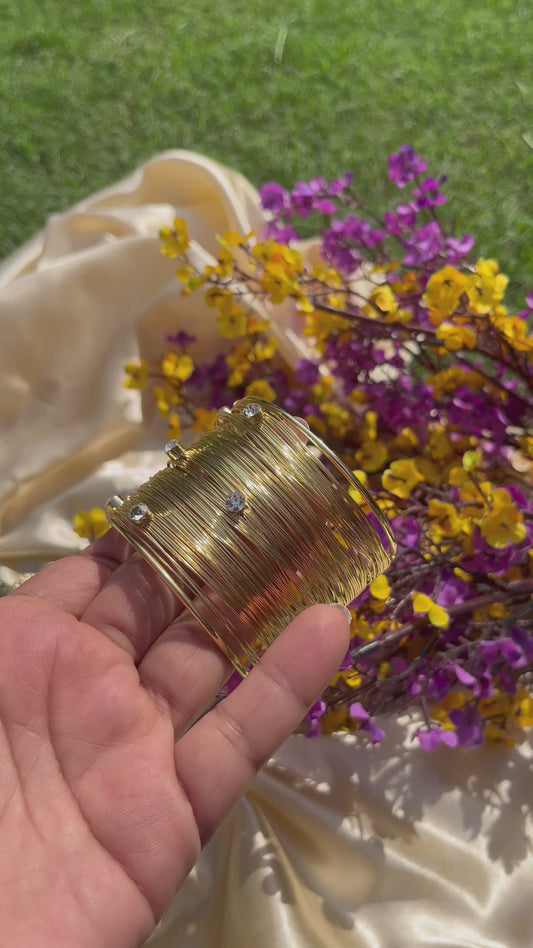gold plated statement cuff bracelet for festive wear

